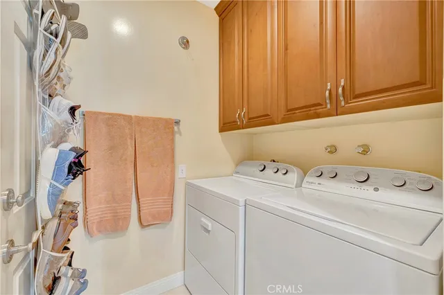 an aerial view of a house with a yard and garden