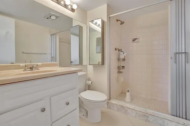 a stove top oven sitting inside of a kitchen