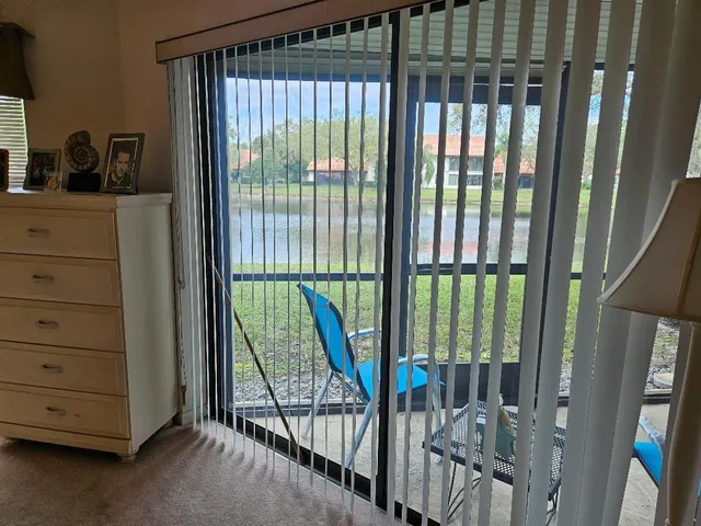 a bathroom with a double vanity sink a mirror a bathtub and shower
