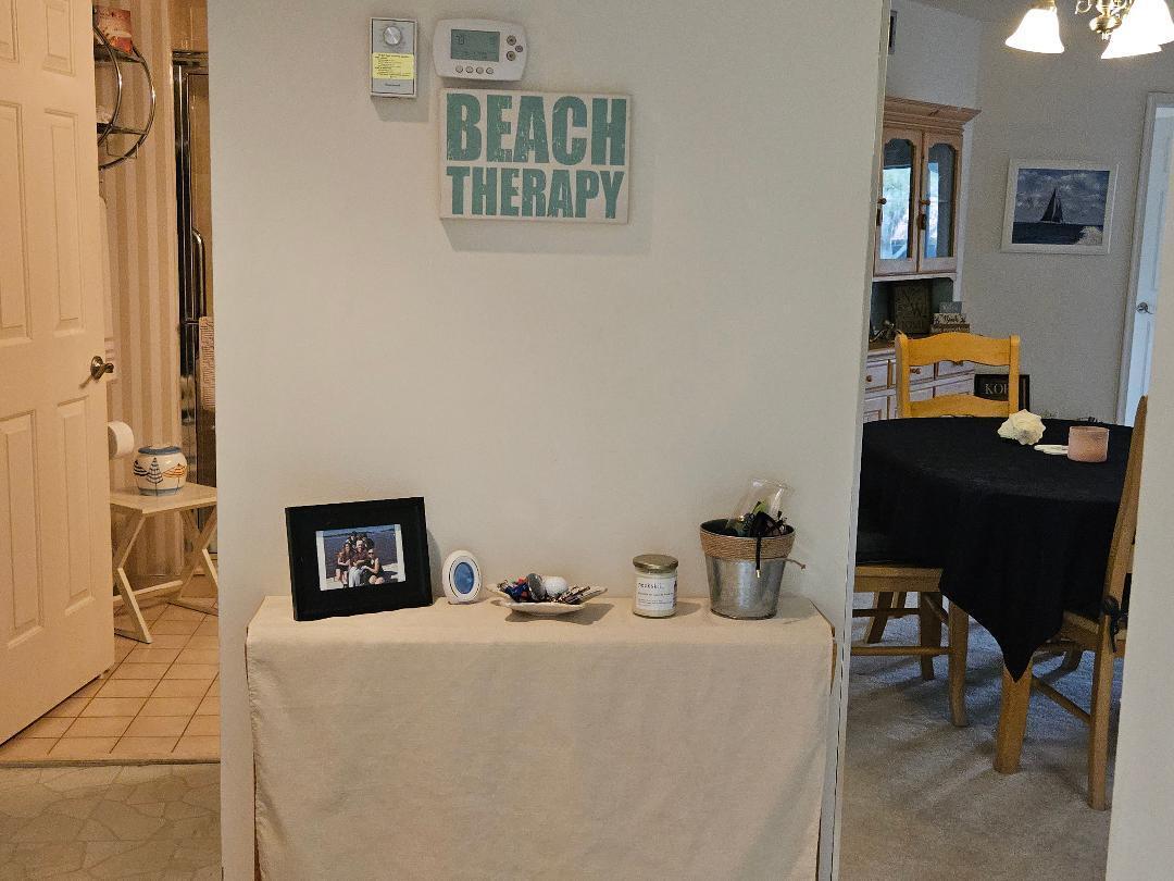 6070 Southeast Martinique Drive, Unit 103 Stuart, FL 34997 - Photo 17 of 30 a bedroom with a workspace