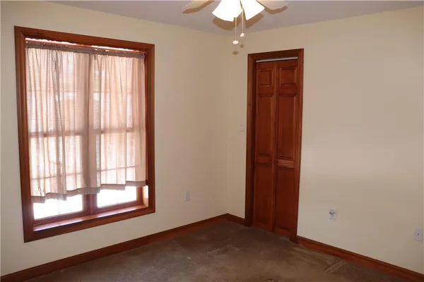 a view of a room with rack on the wall