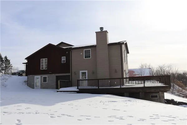 a view of a house with a roof yard