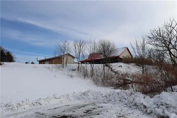 a view of a backyard of the house