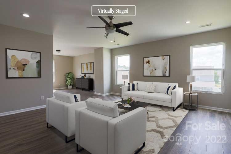 12507 Bending Branch Road Charlotte, NC 28227 - Photo 2 of 23 a living room with furniture and a wooden floor