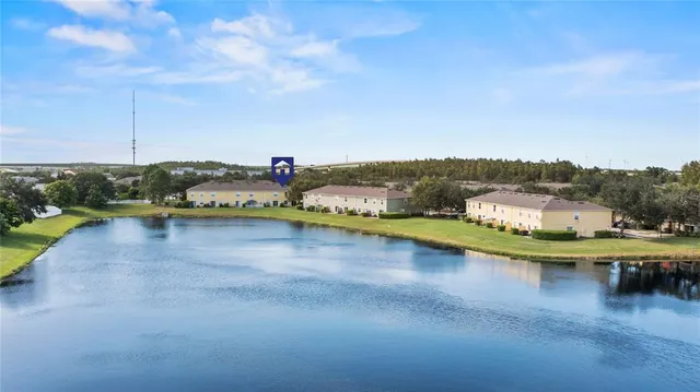 a view of a swimming pool and lake view