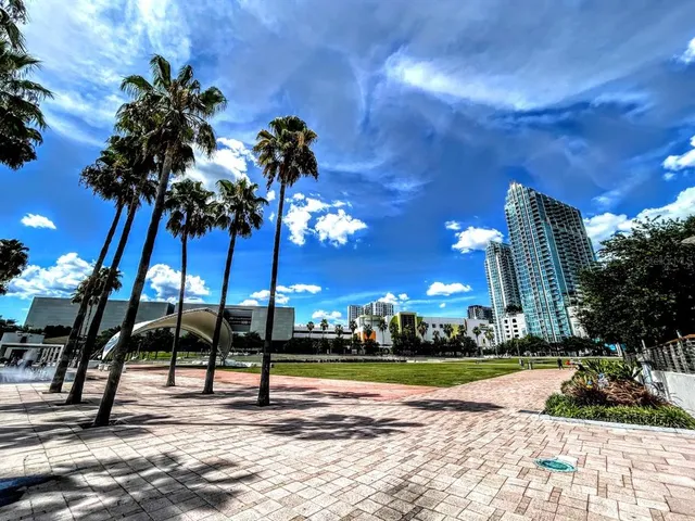 a view of a street with cars on road