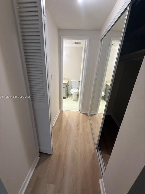 4200 Hillcrest Drive, Unit 206 Hollywood, FL 33021 - Photo 12 of 15 a view of a hallway view with wooden floor and staircase