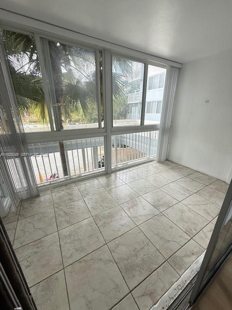 4200 Hillcrest Drive, Unit 206 Hollywood, FL 33021 - Photo 15 of 15 a view of an empty room with a window