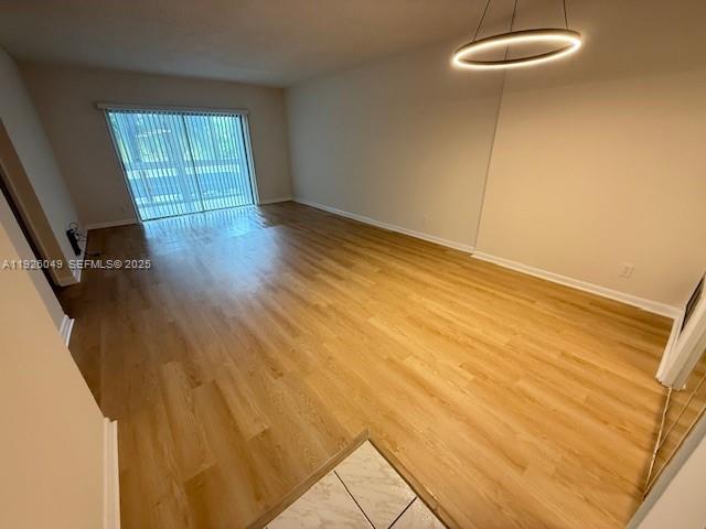 4200 Hillcrest Drive, Unit 206 Hollywood, FL 33021 - Photo 3 of 15 a view of an empty room with a window