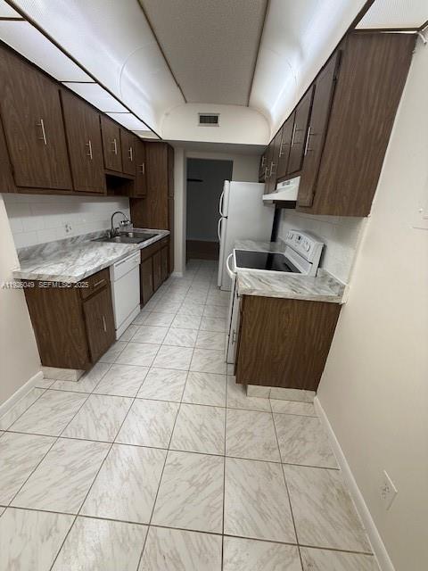 4200 Hillcrest Drive, Unit 206 Hollywood, FL 33021 - Photo 7 of 15 a kitchen with a cabinets and counter space