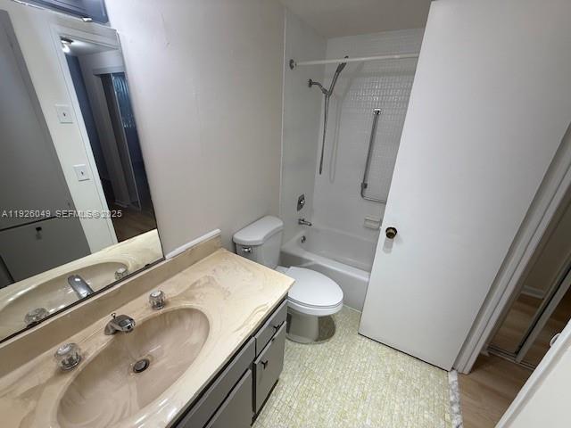 4200 Hillcrest Drive, Unit 206 Hollywood, FL 33021 - Photo 10 of 15 a bathroom with a sink a toilet and shower