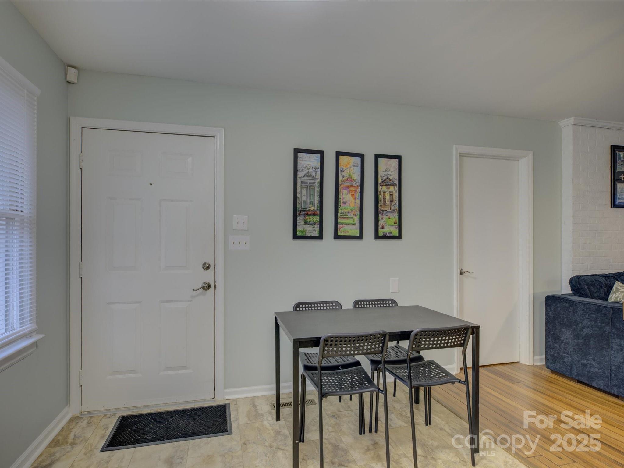 228 Ridge Drive Harrisburg, NC 28075 - Photo 12 of 27 a view of a livingroom with furniture and wooden floor