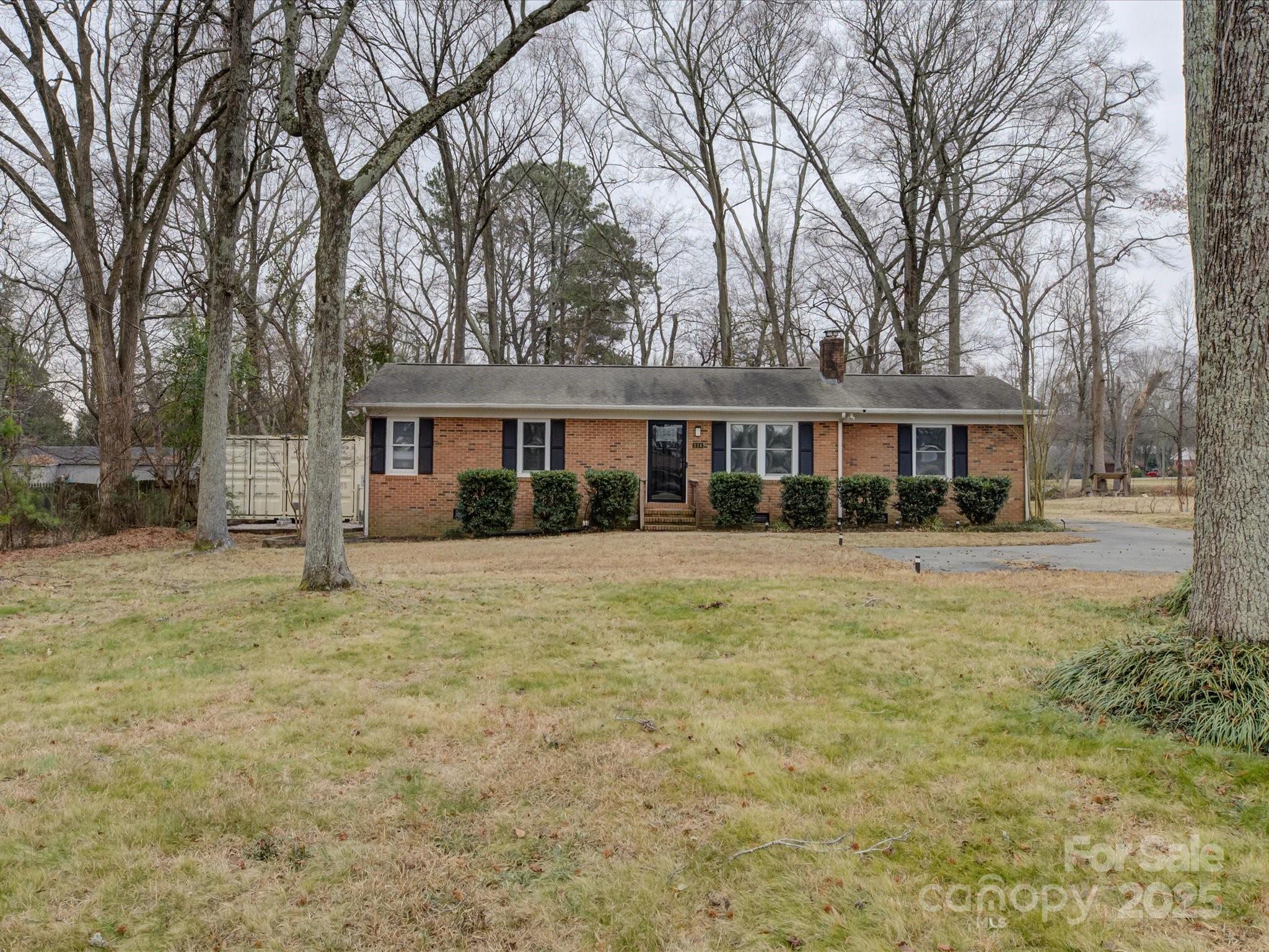 228 Ridge Drive Harrisburg, NC 28075 - Photo 3 of 27 a front view of a house with a yard