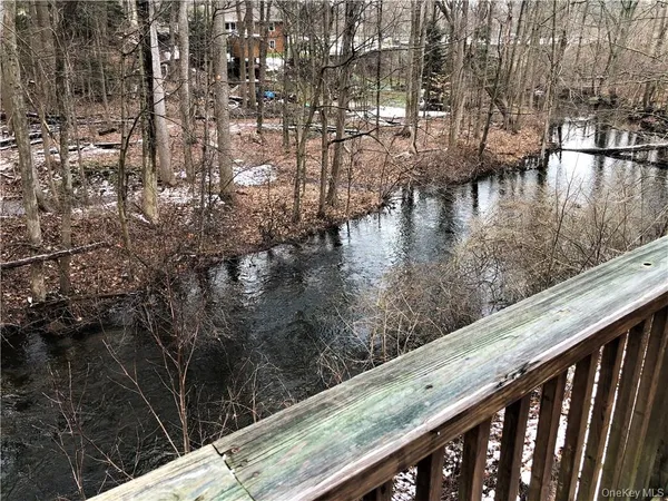a view of swimming pool from a balcony