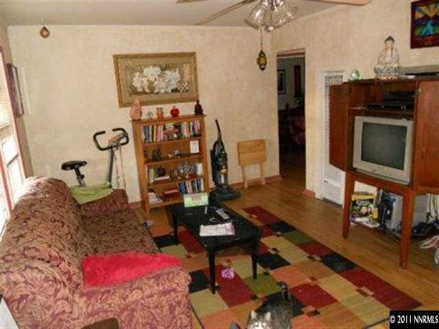 650 Hood Avenue Reno, NV 89512 - Photo 2 of 12 a living room with furniture and a flat screen tv