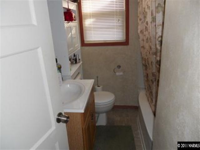 650 Hood Avenue Reno, NV 89512 - Photo 4 of 12 a bathroom with a sink and toilet