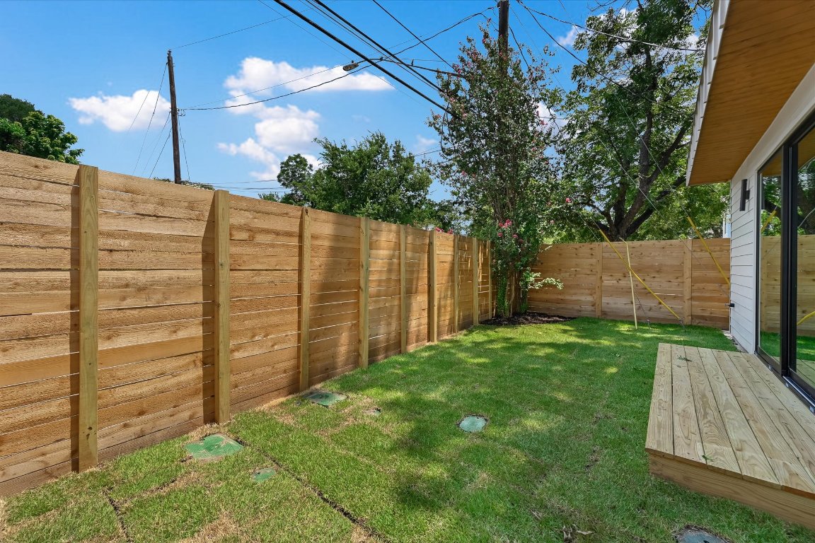 2705 Francisco Street, Unit A Austin, TX 78702 - Photo 18 of 21 Fenced backyard with a deck