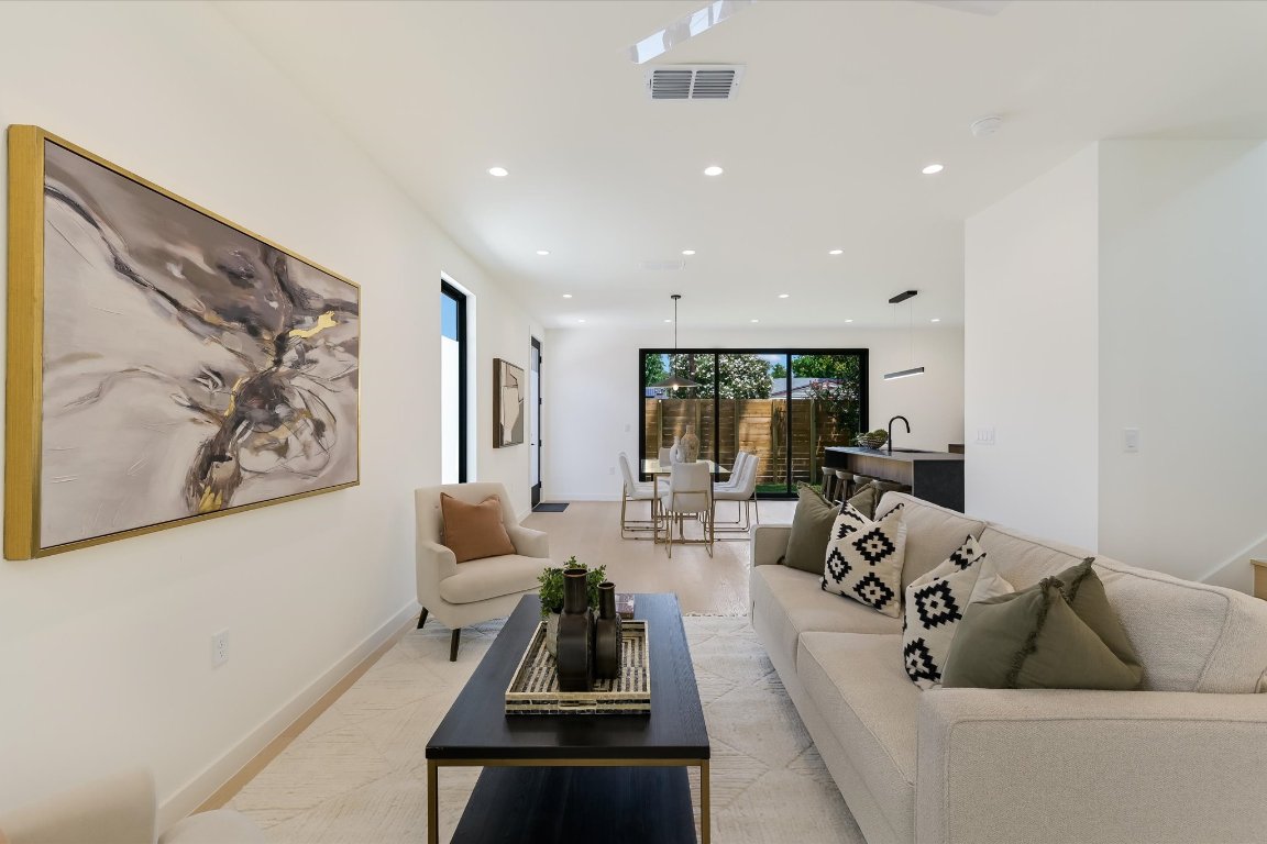 2705 Francisco Street, Unit A Austin, TX 78702 - Photo 5 of 21 Living room with recessed lighting and baseboards
