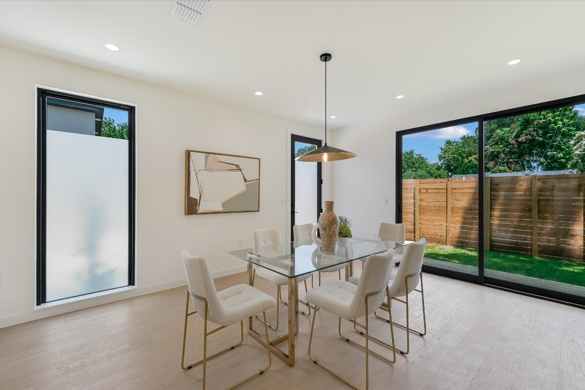2705 Francisco Street, Unit A Austin, TX 78702 - Photo 10 of 21 Dining room featuring light wood-style flooring and recessed lighting