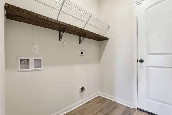 a bathroom with a sink a mirror and a toilet