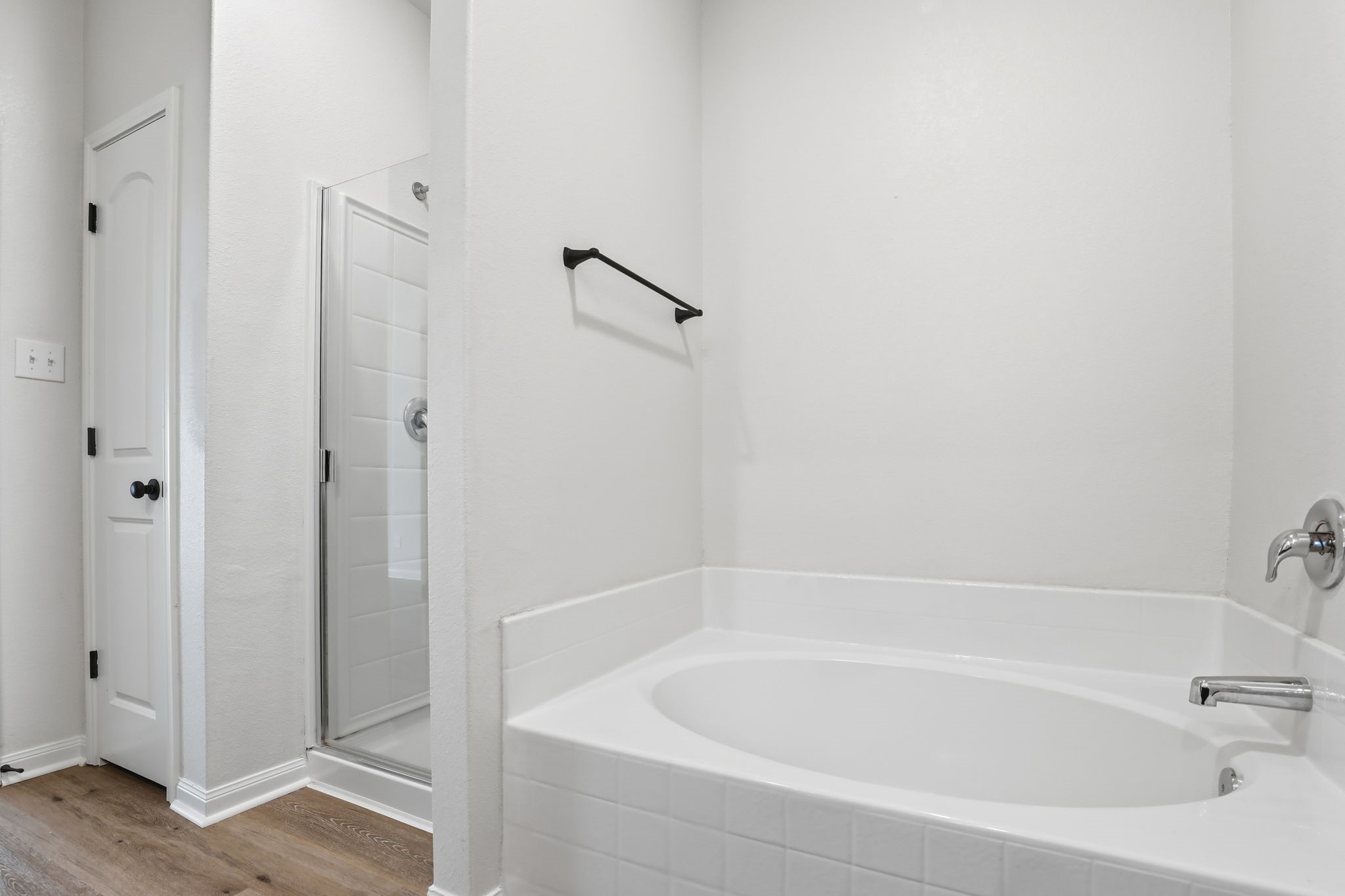 2044 Mule Ridge Drive Katy, TX 77493 - Photo 23 of 38 a white bath tub sitting next to a shower