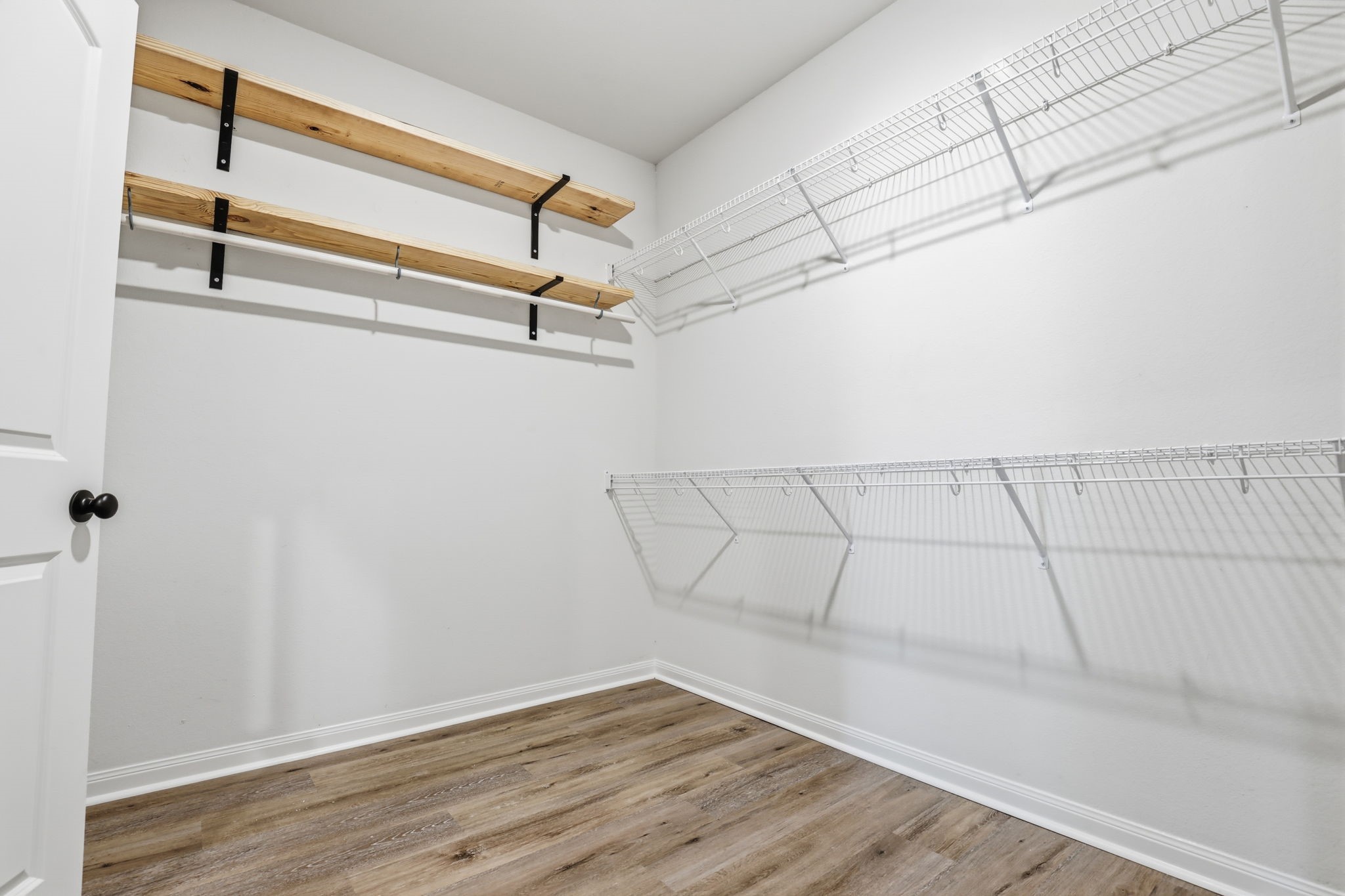 2044 Mule Ridge Drive Katy, TX 77493 - Photo 24 of 38 a view of a room with racks on the wall