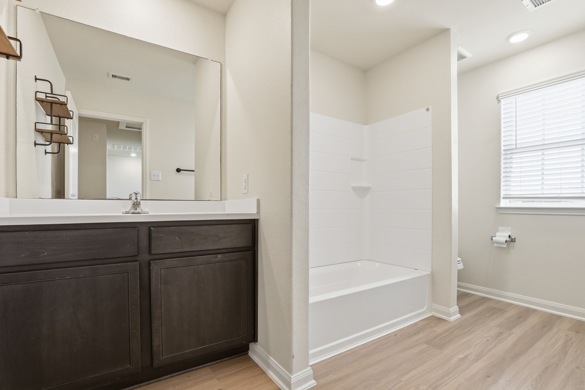 2044 Mule Ridge Drive Katy, TX 77493 - Photo 28 of 38 a bathroom with a bathtub and a sink