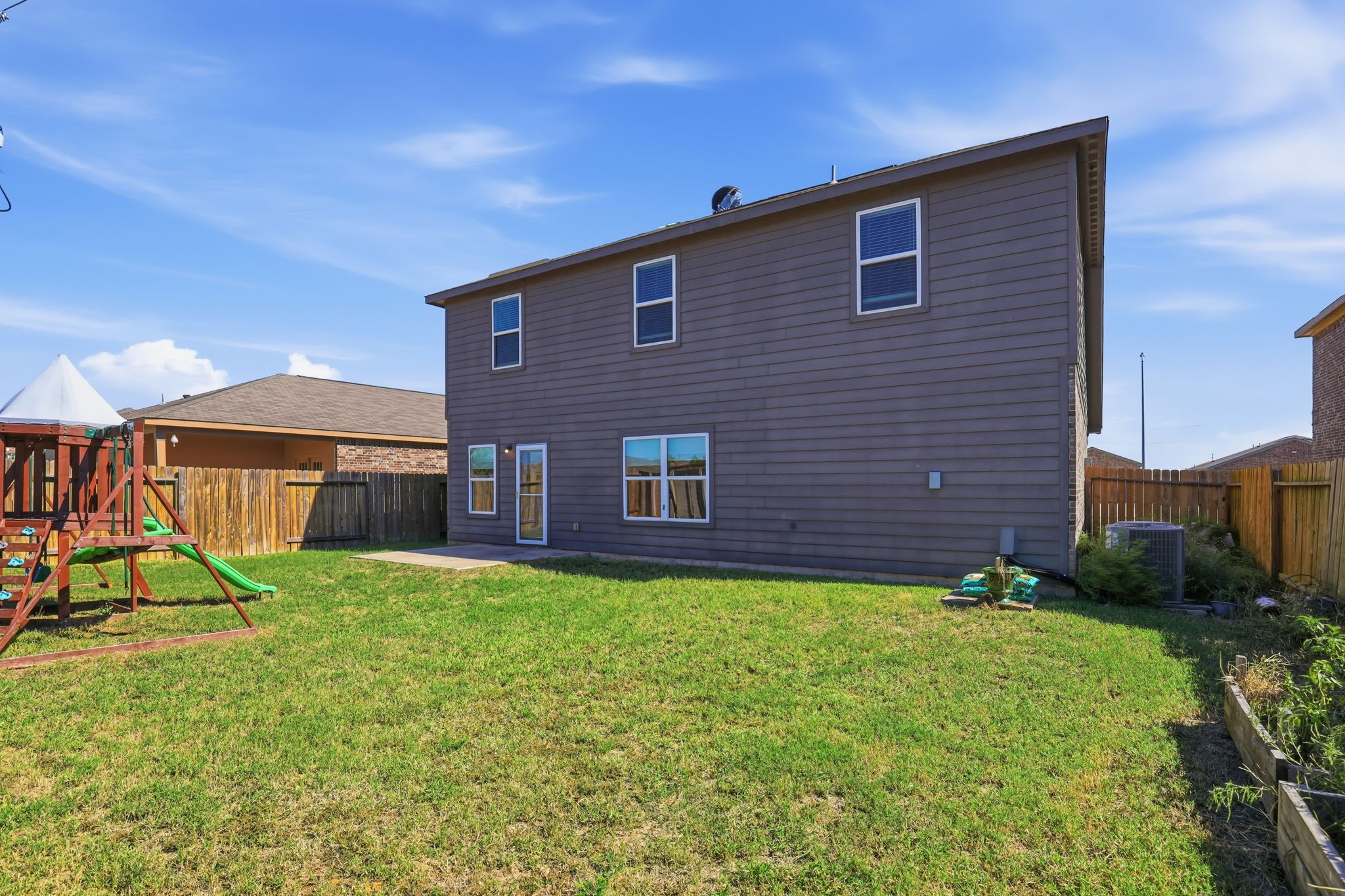 2044 Mule Ridge Drive Katy, TX 77493 - Photo 34 of 38 a view of a house with a yard