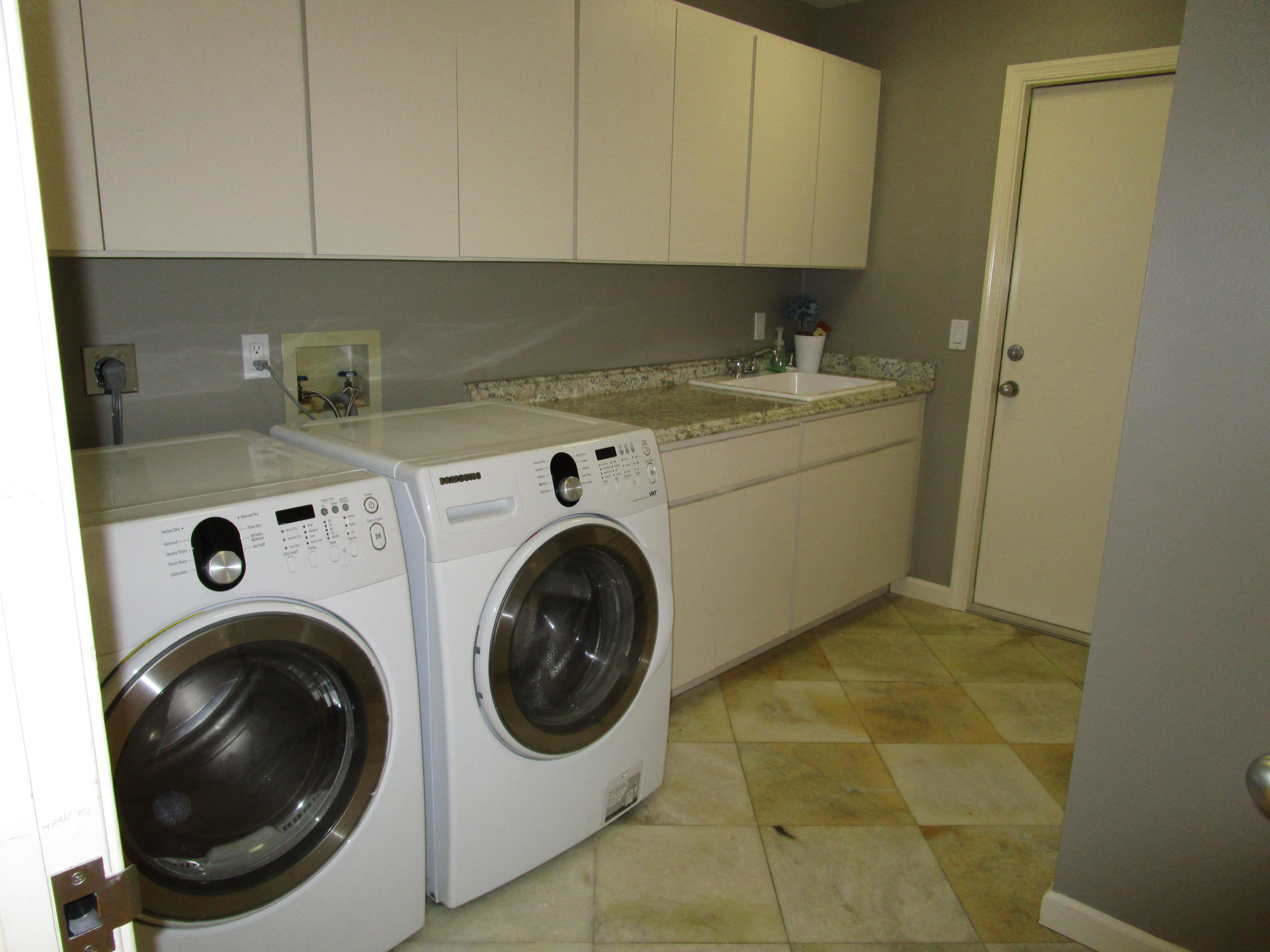 25 Rabbits Run Palm Beach Gardens, FL 33418 - Photo 22 of 22 Newer Washer/ Dryer