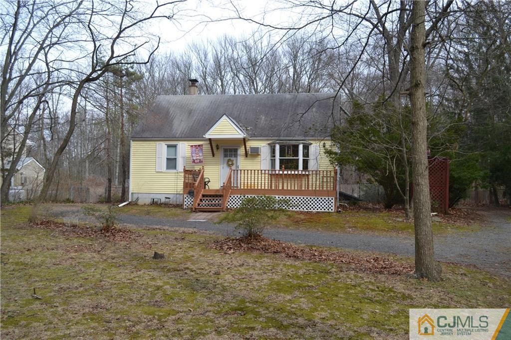 1526 Englishtown Road Old Bridge, NJ 08857 - Photo 1 of 6 a view of a house with large trees and covered area
