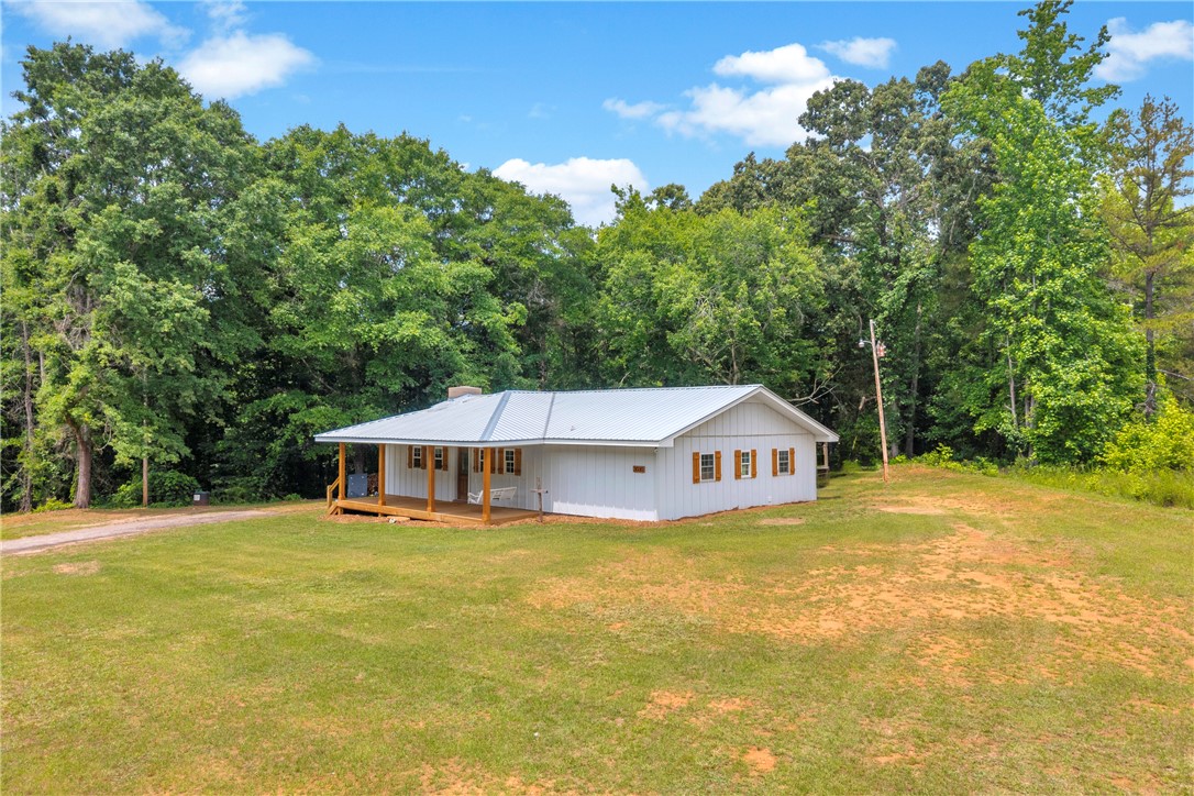 3030 Smith McGee Road Iva, SC 29655 - Photo 43 of 46 A classic ranch home nestled among abundant greenery offers a peaceful country setting.