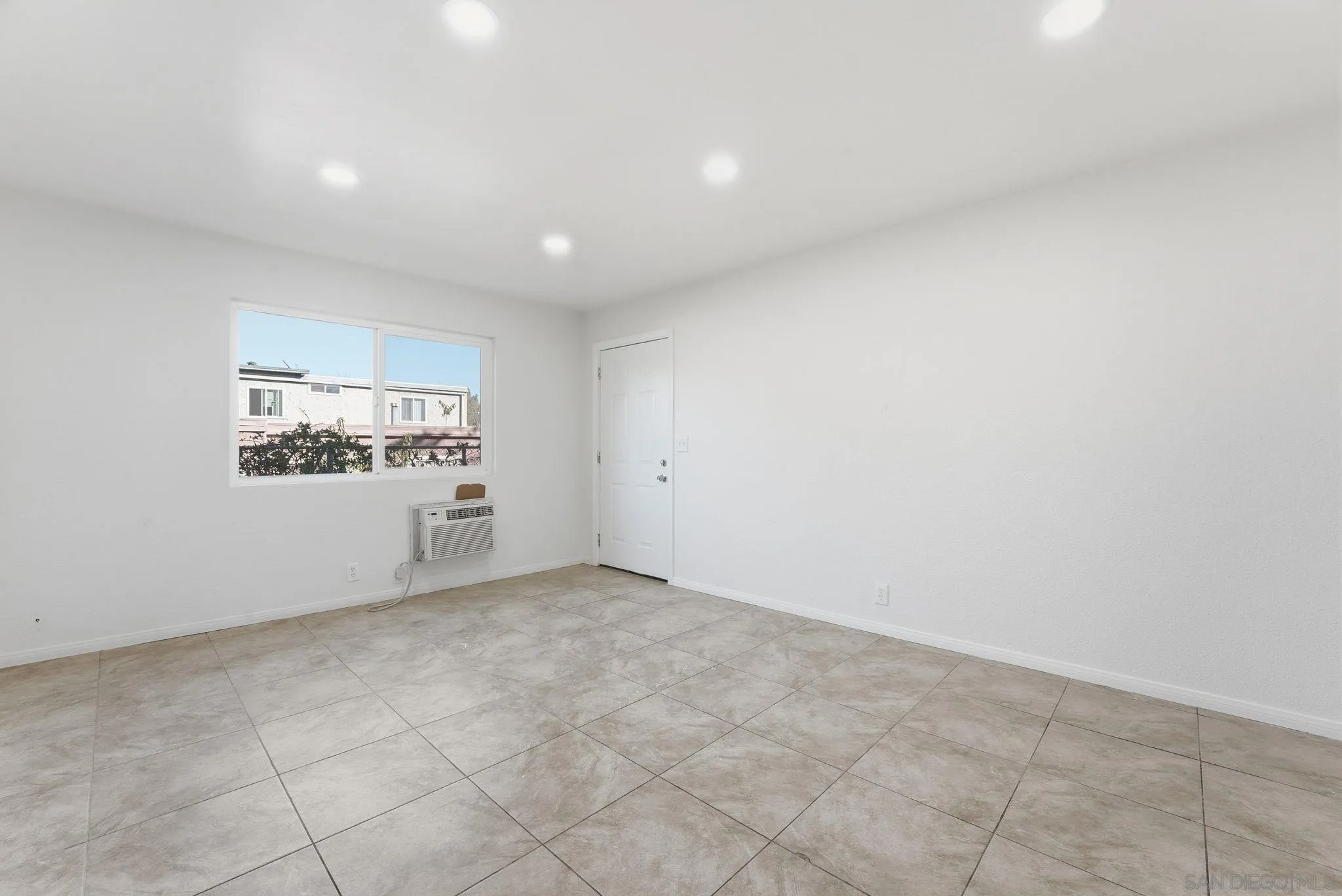 12621 Lindo Lane Lakeside, CA 92040 - Photo 17 of 28 an empty room with windows