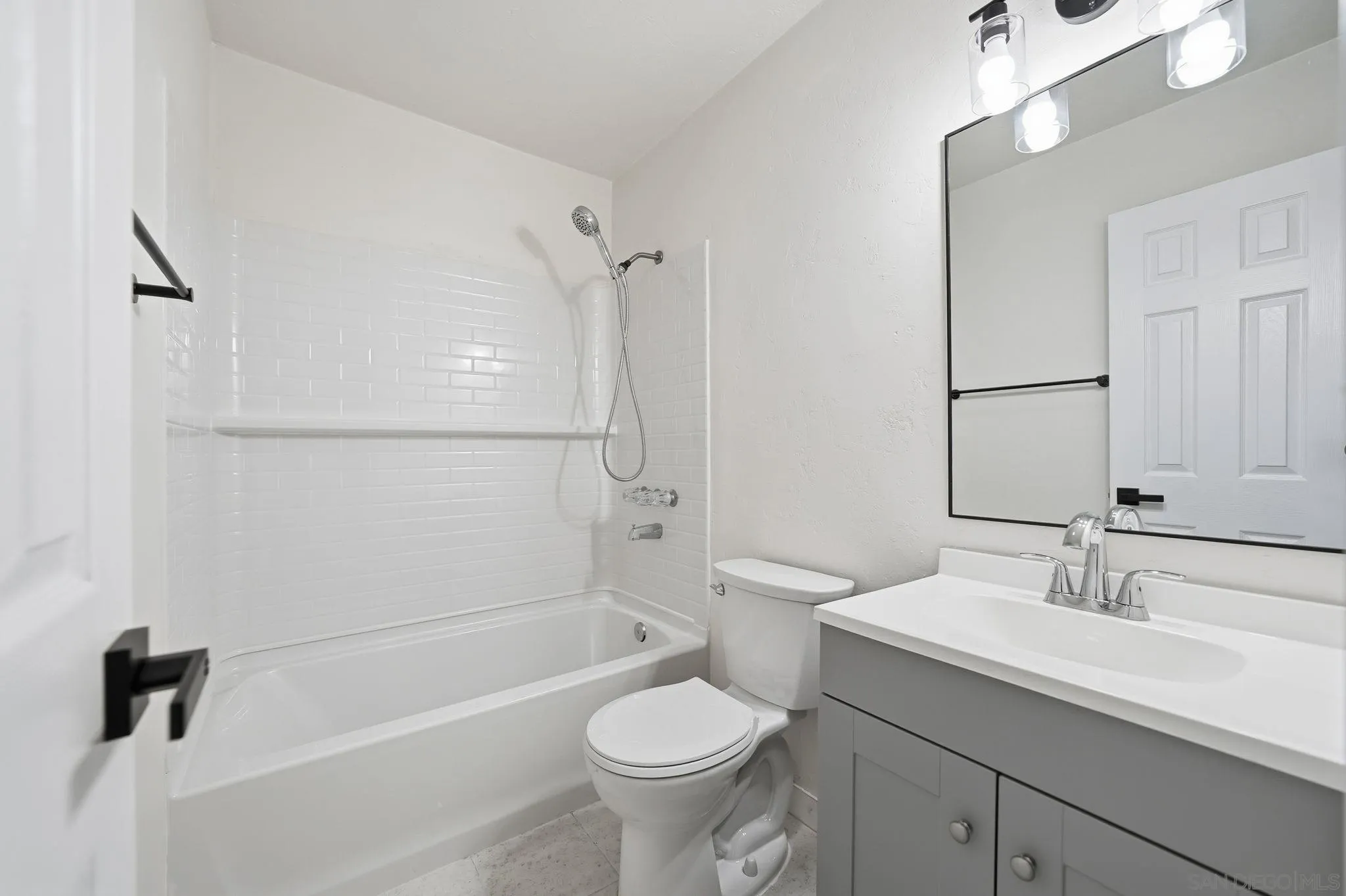 12621 Lindo Lane Lakeside, CA 92040 - Photo 28 of 28 a bathroom with a sink a toilet and a mirror