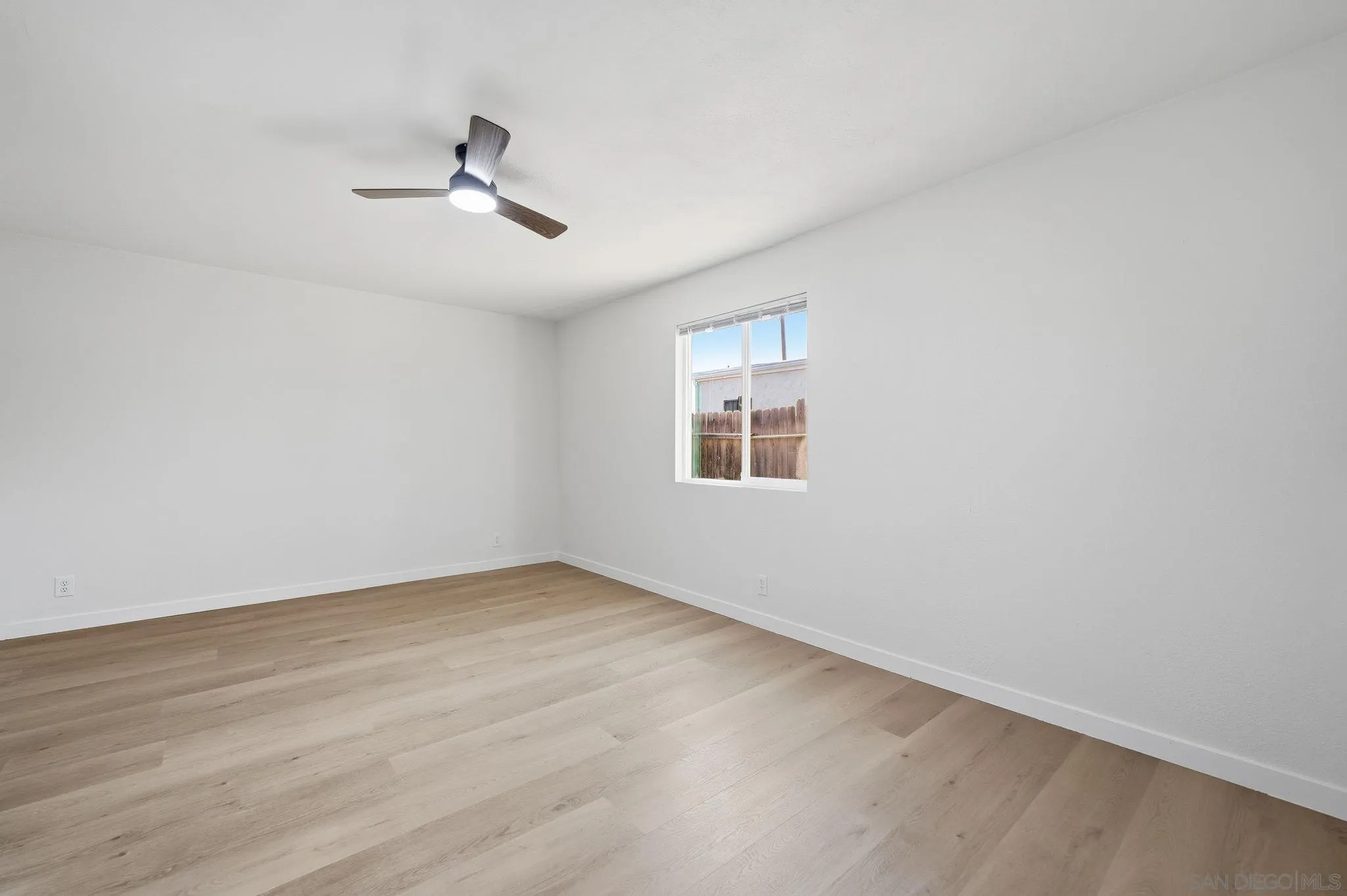 12621 Lindo Lane Lakeside, CA 92040 - Photo 10 of 28 wooden floor in an empty room with a window
