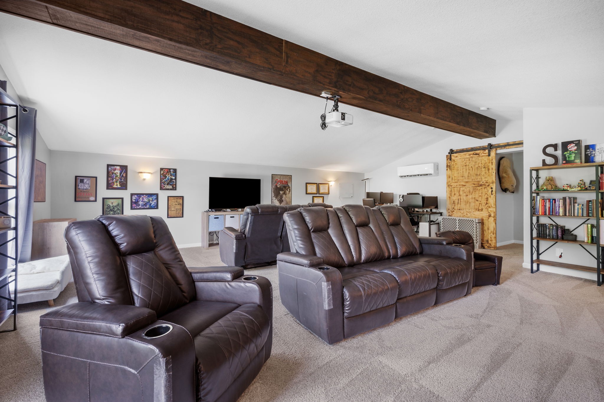 1197 Biter Road Cunningham, TN 37052 - Photo 29 of 38 a living room with furniture a flat screen tv and a fireplace