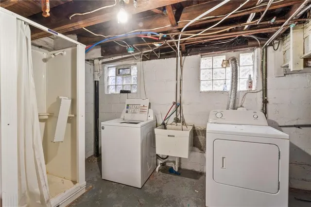 a utility room with dryer and washer