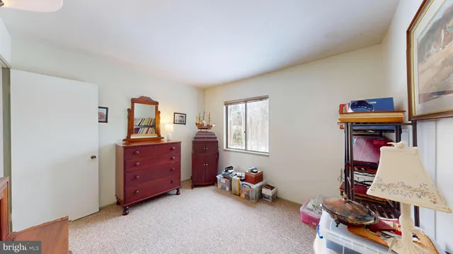 a room with furniture and a window