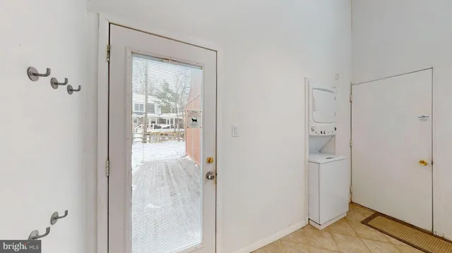 a view of a bathroom with a glass door