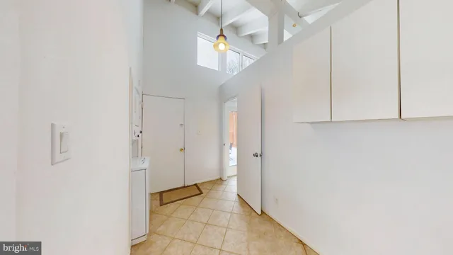 a view of a hallway with entryway