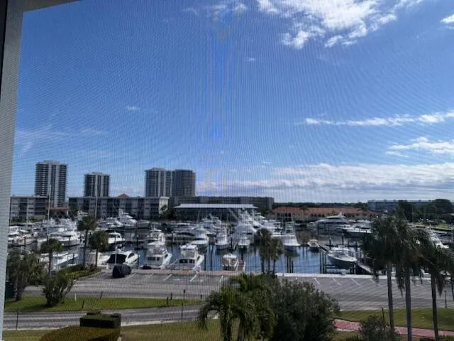 a kitchen with stainless steel appliances granite countertop a refrigerator stove and microwave