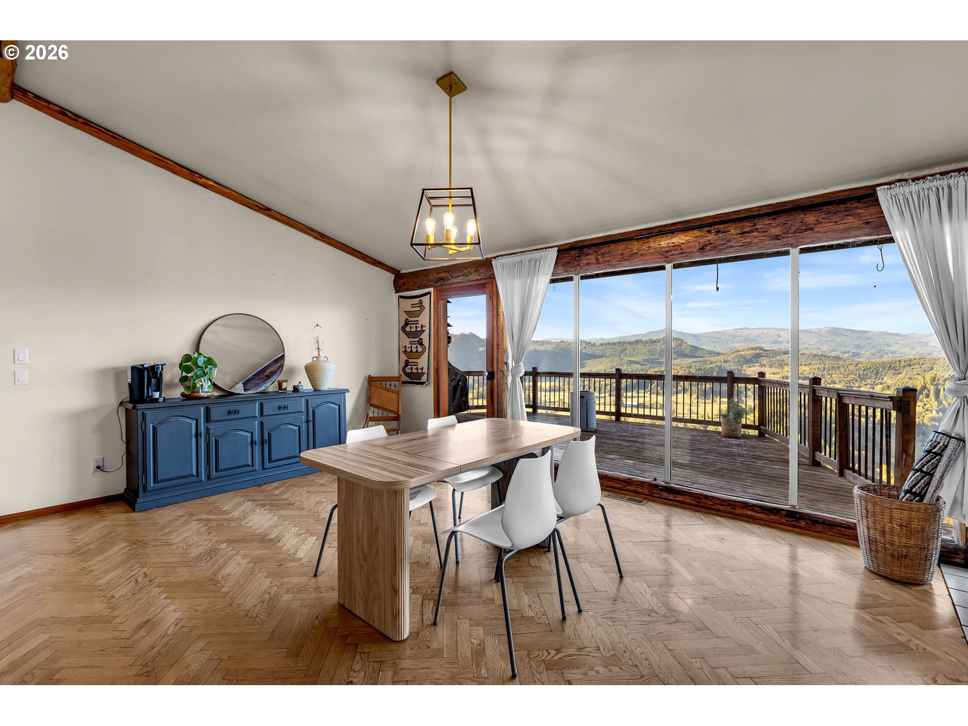 39904 Northeast Rotschy Road Yacolt, WA 98675 - Photo 12 of 48 a view of a dining room with furniture and a chandelier