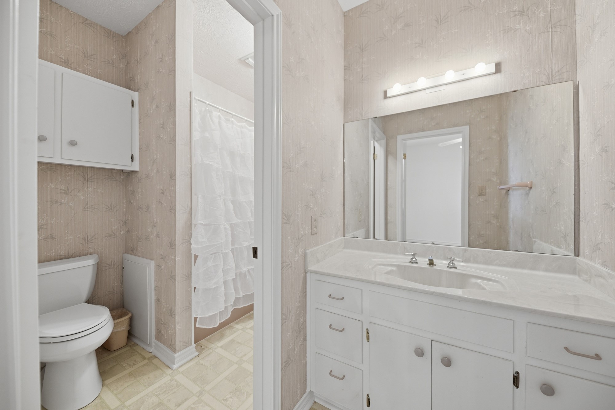 1552 Holub Road Schulenburg, TX 78956 - Photo 22 of 45 Vanity for bedroom 2 and access to bathroom
