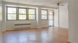 an empty room with windows