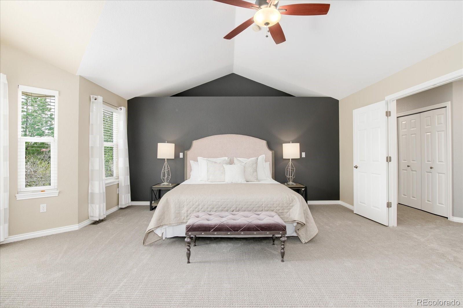 9318 Reed Way Broomfield, CO 80021 - Photo 19 of 33 a bedroom with a bed and window