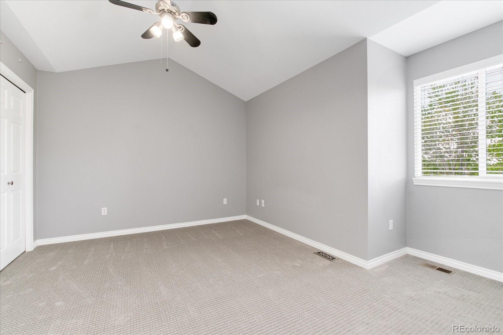 9318 Reed Way Broomfield, CO 80021 - Photo 25 of 33 an empty room with a window