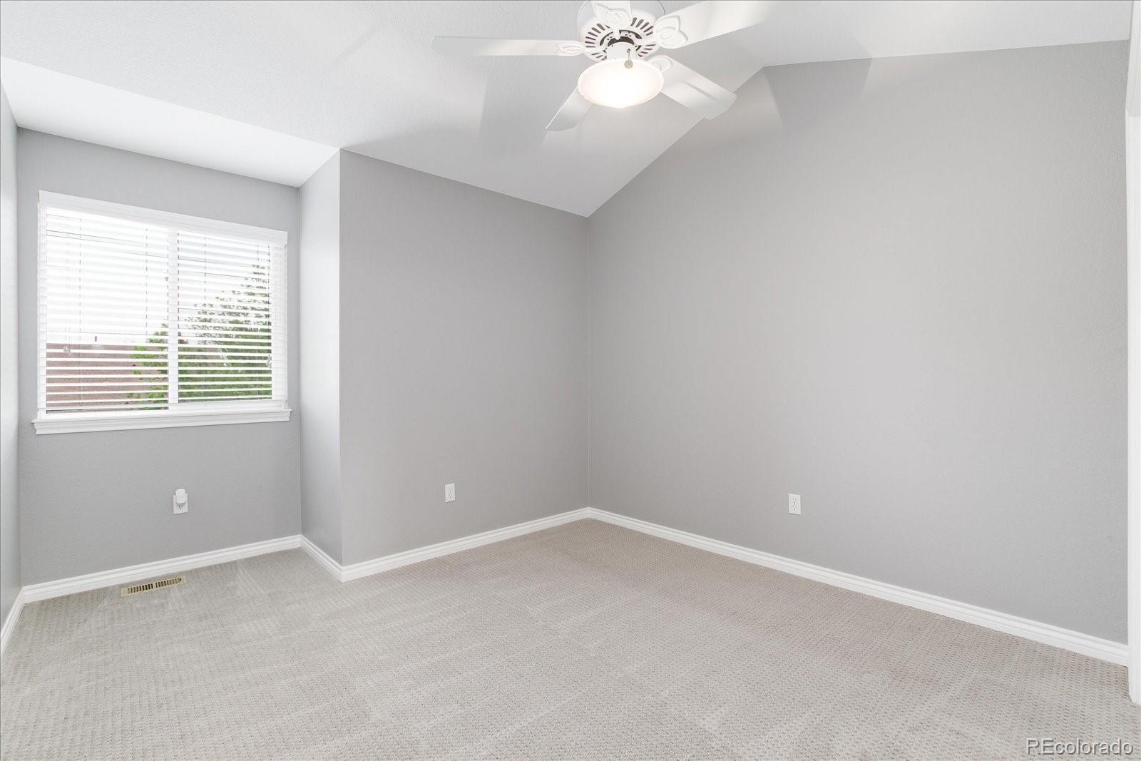 9318 Reed Way Broomfield, CO 80021 - Photo 27 of 33 a view of an empty room with a window