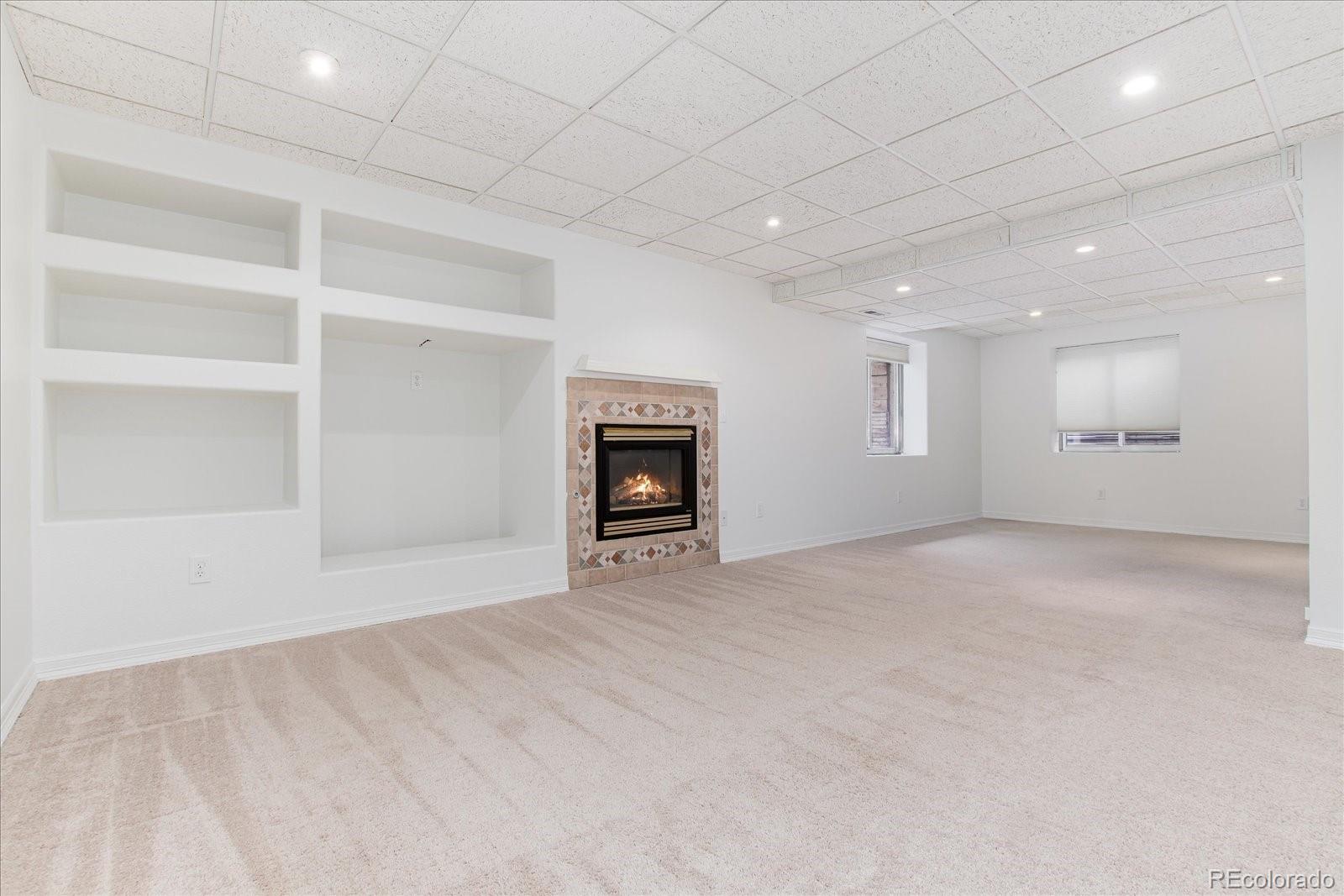 9318 Reed Way Broomfield, CO 80021 - Photo 28 of 33 an empty room with a empty space and window