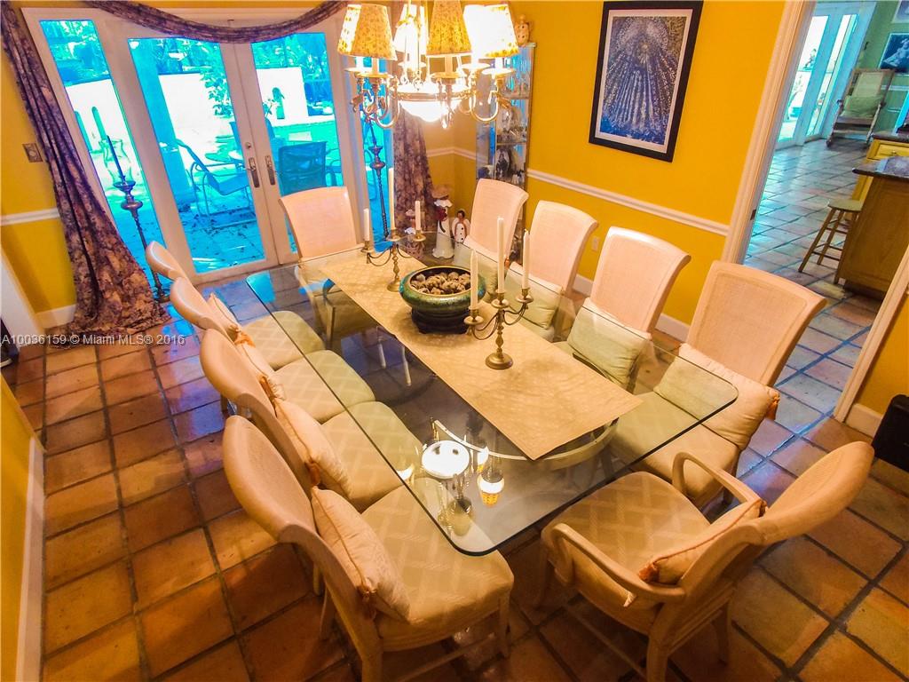 6950 Granada Boulevard Coral Gables, FL 33146 - Photo 3 of 15 a picture of a living room with a rug