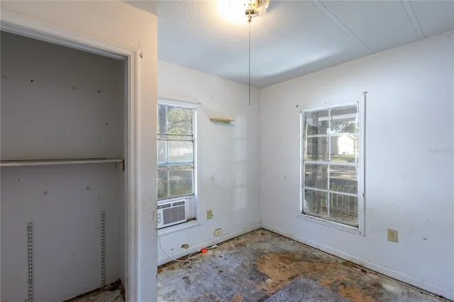 an empty room with windows