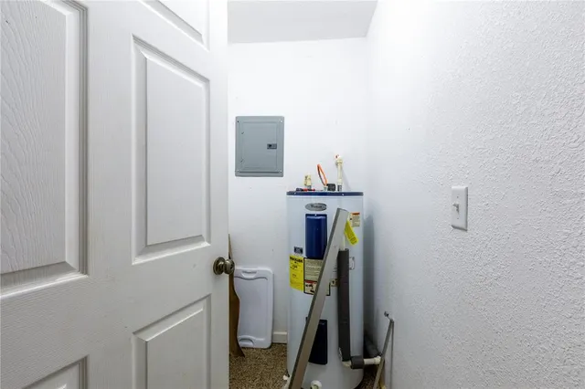 a view of storage and utility room with washer and dryer